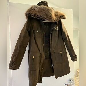 Waxed women’s Barbour winter jacket with fur hood